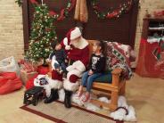 Santa visits with families